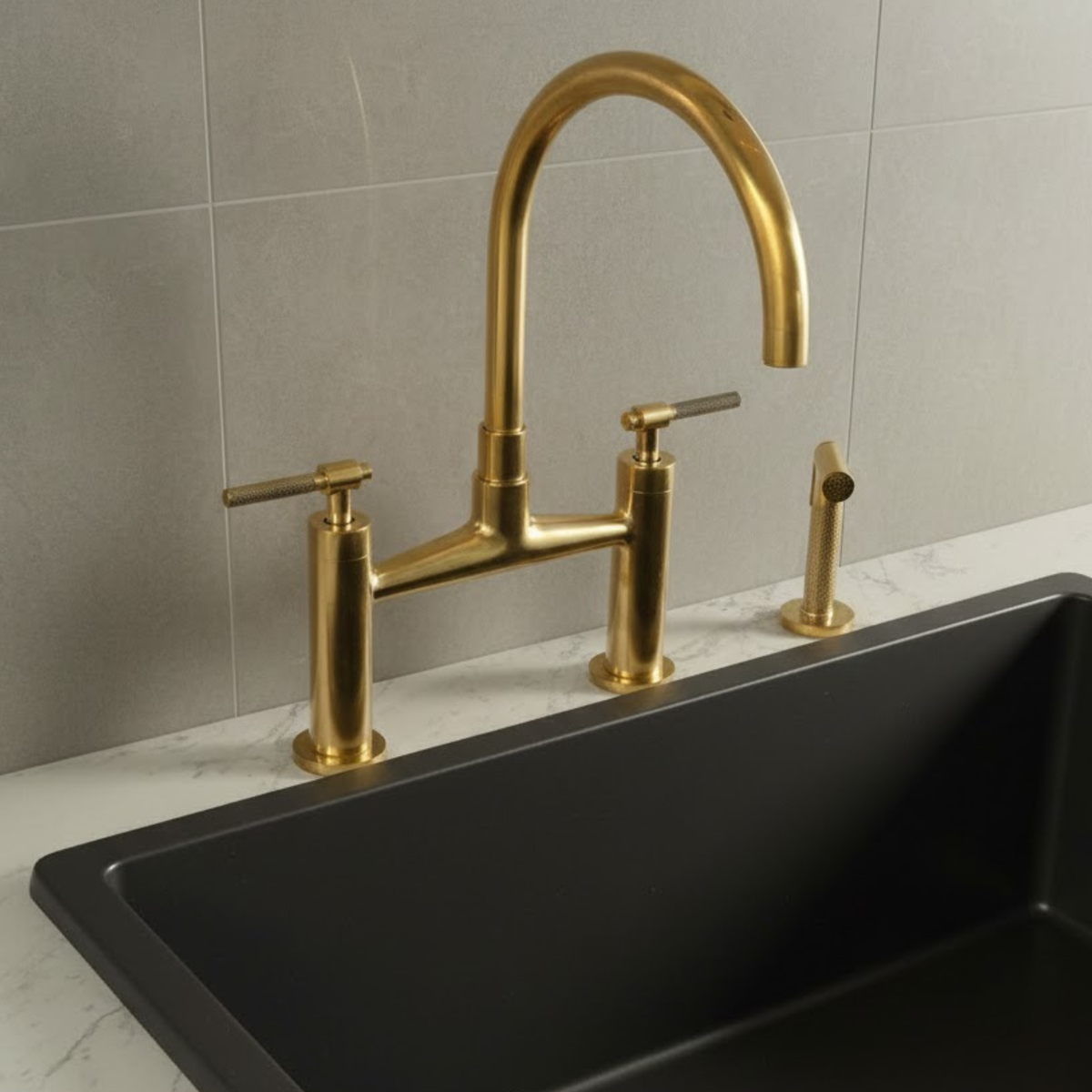 Unlacquered brass kitchen faucet with matching side sprayer and bridge design