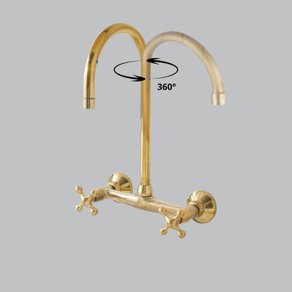 Wall mounted brass faucet with curved spout and dual handles