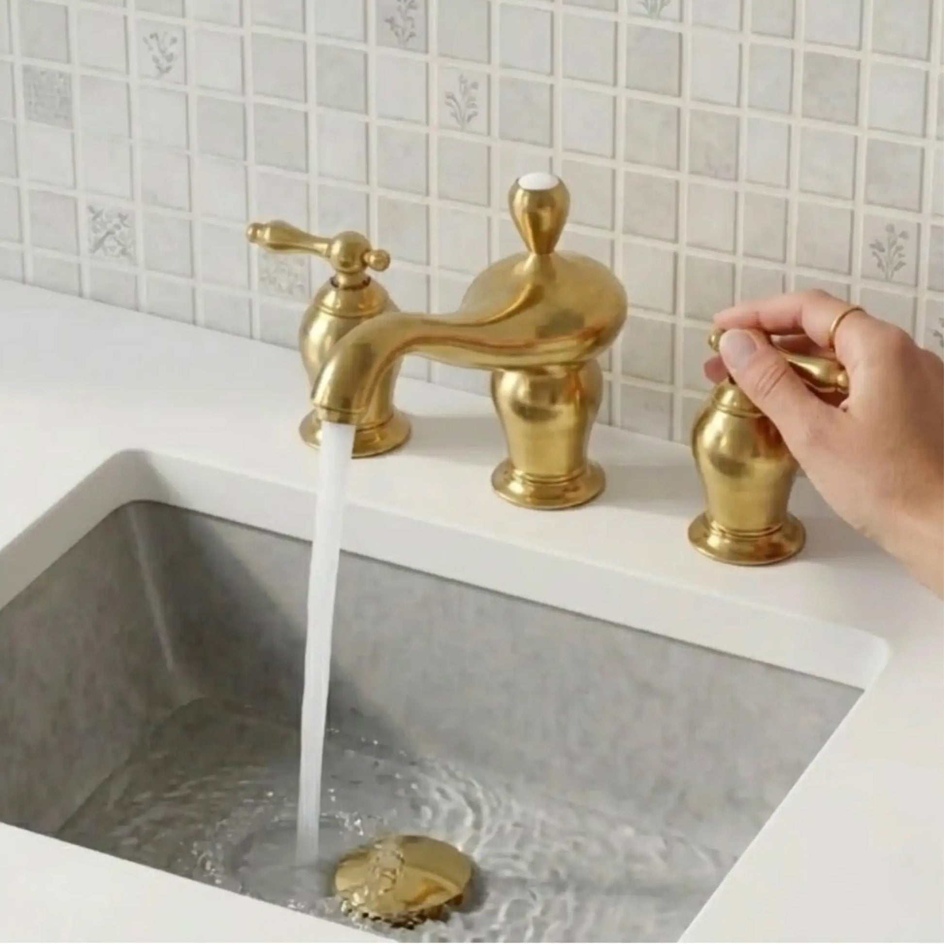 Unlacquered brass widespread bathroom faucet with cross handles running water in modern sink – luxury solid brass fixture by BrassOna