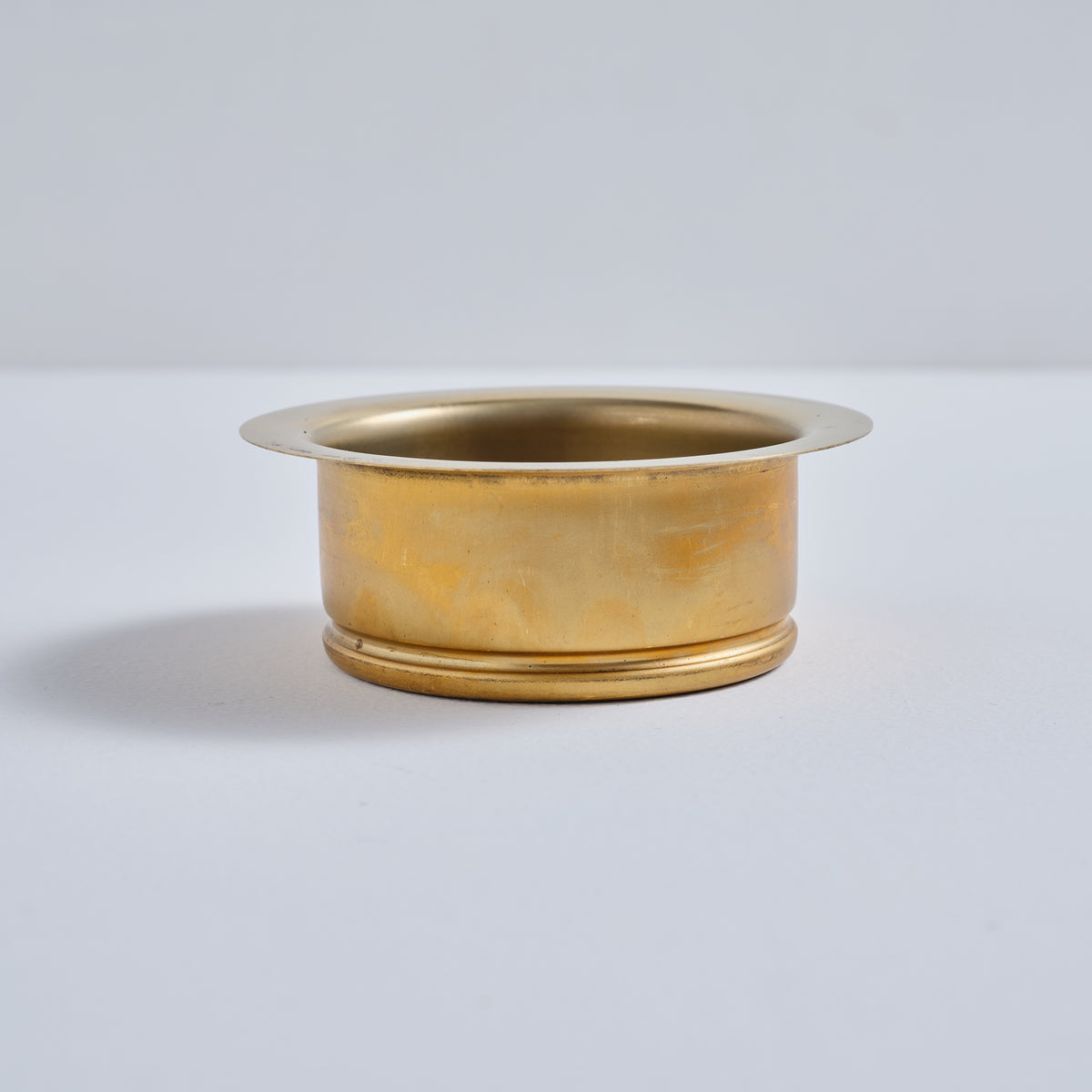 Side profile of a durable solid brass sink flange designed for premium kitchen drains.