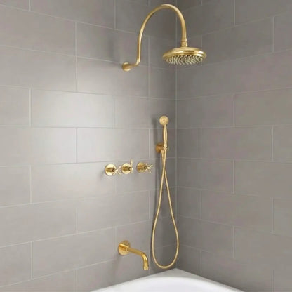 unlacquered brass rainfall shower system with handheld sprayer installed on modern bathroom gray tile wall