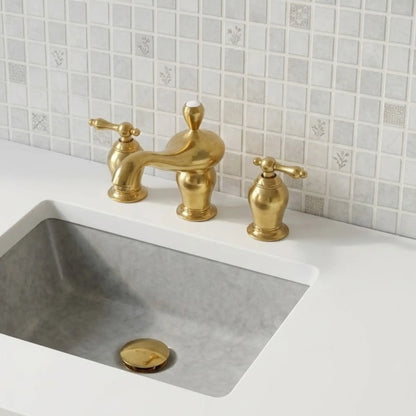 Aurelia unlacquered brass widespread bathroom faucet with lever handles installed on marble sink vanity with tiled backsplash