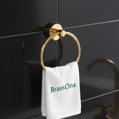 Wall-mounted brass towel ring showing side profile and concealed mounting design
