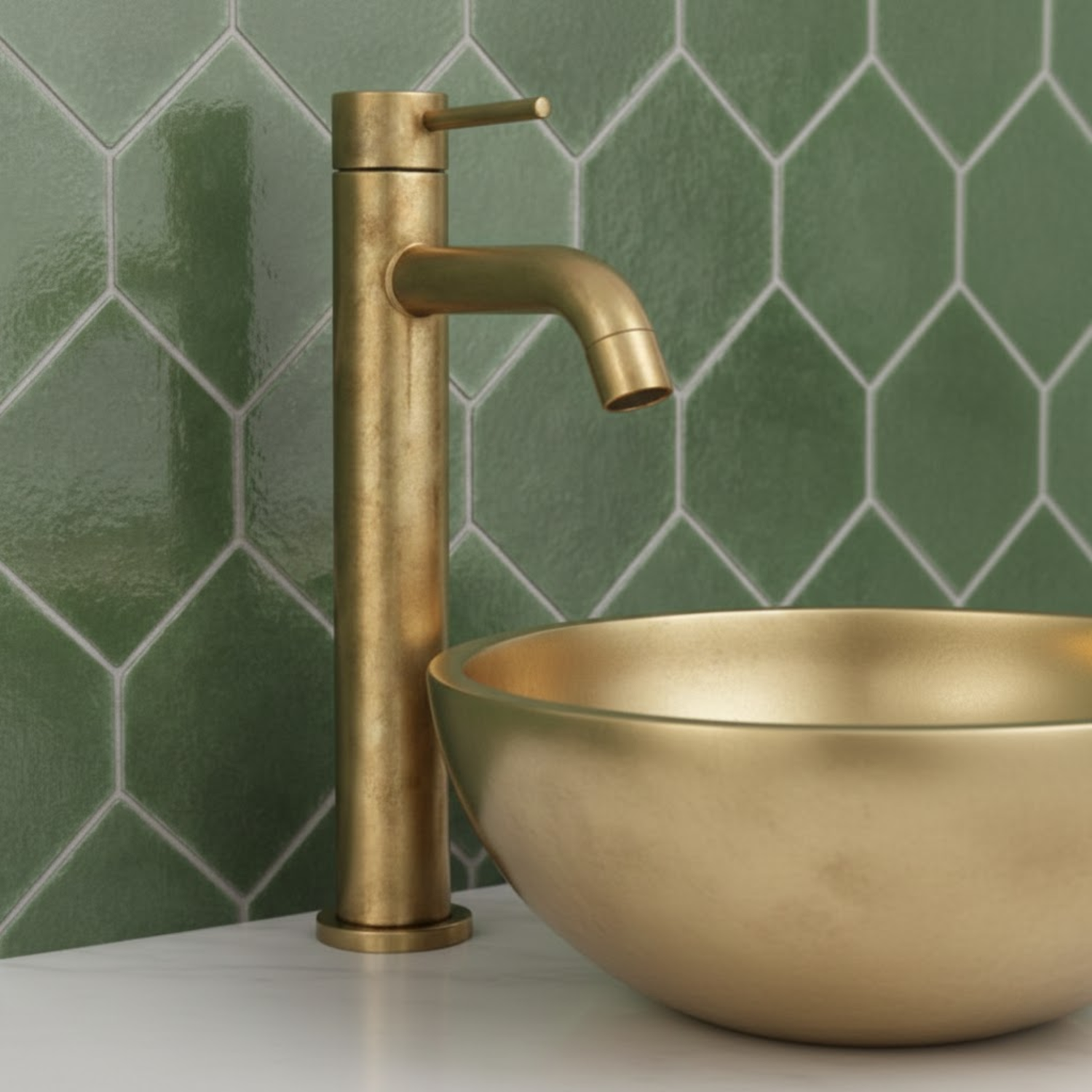 BrassOna Unlacquered solid brass vessel bathroom faucet installed with brass bowl sink against green tiled .wall.