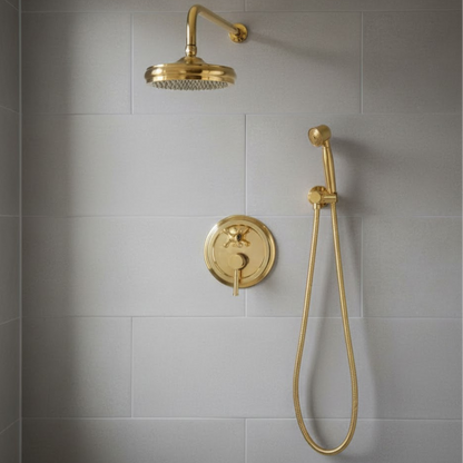 Aesthetic lighting shot of the 10-inch ultra-thin rainfall shower head and handheld wand in a modern bathroom setting.