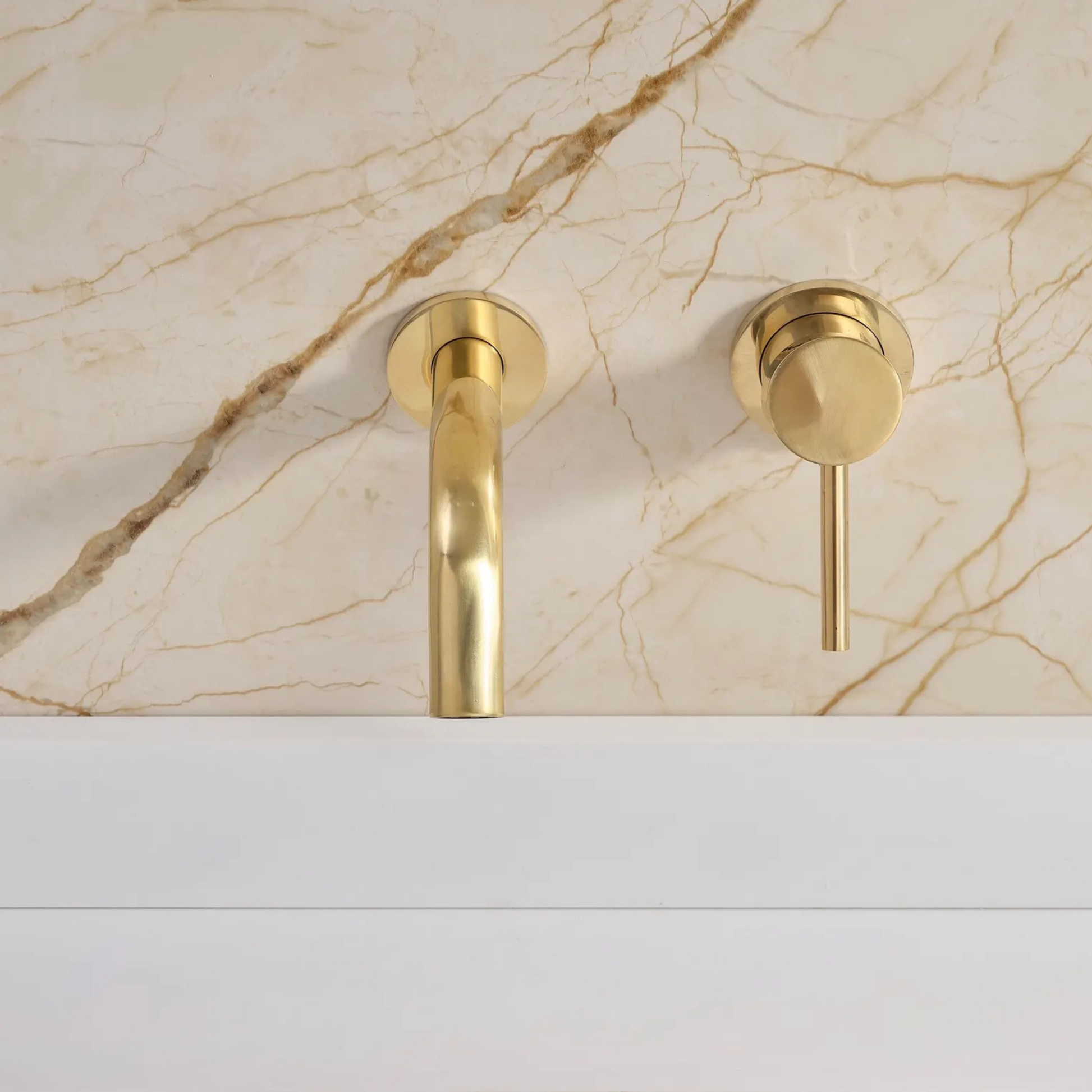 Solid brass wall-mounted bathroom faucet with single handle and modern design
