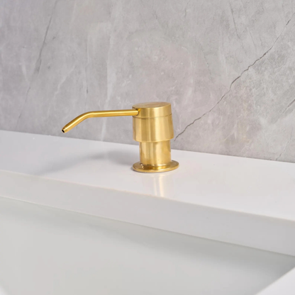 Side view of a solid unlacquered brass soap pump showing the elegant 4-inch spout reach and self-priming mechanism.