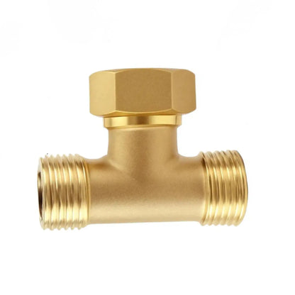 Brass plumbing tee fitting on a white background