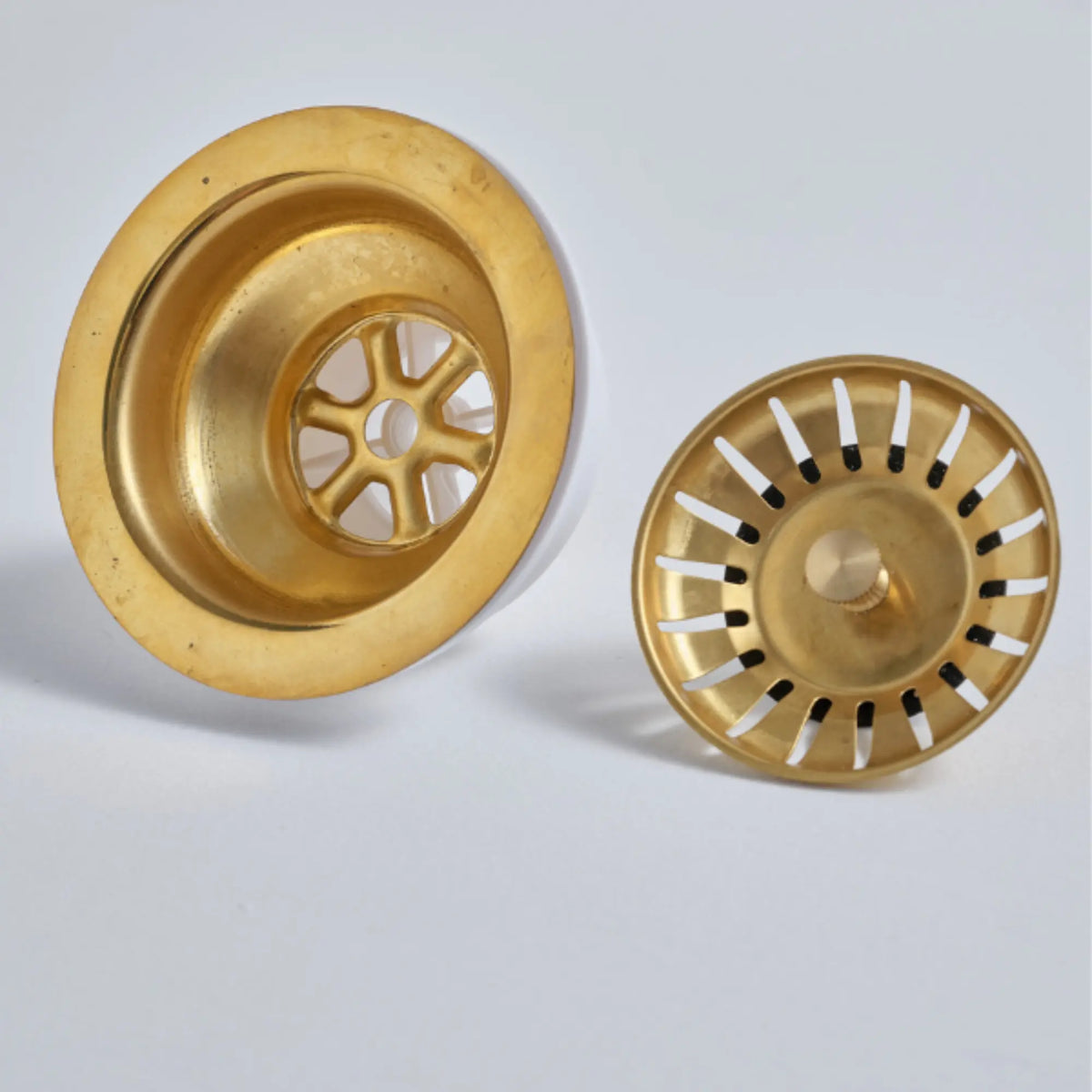 Premium 14-gauge solid unlacquered brass basket strainer and kitchen sink drain assembly.