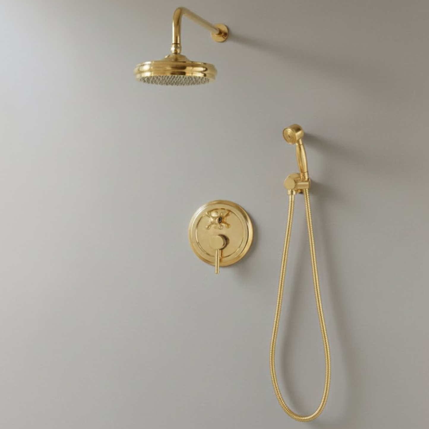 Main view of the ShowerLux unlacquered brass shower system featuring a rainfall shower head, handheld sprayer, and circular mixing valve