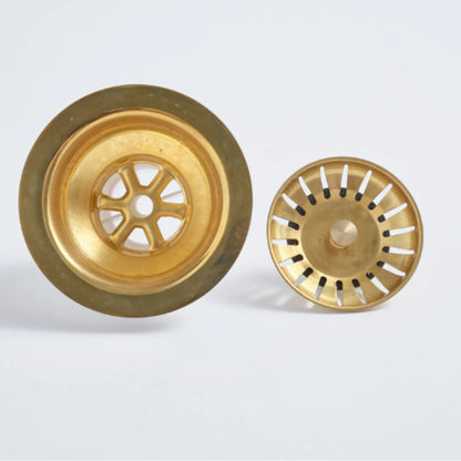 Overhead view of the star-patterned unlacquered brass strainer basket with a living finish