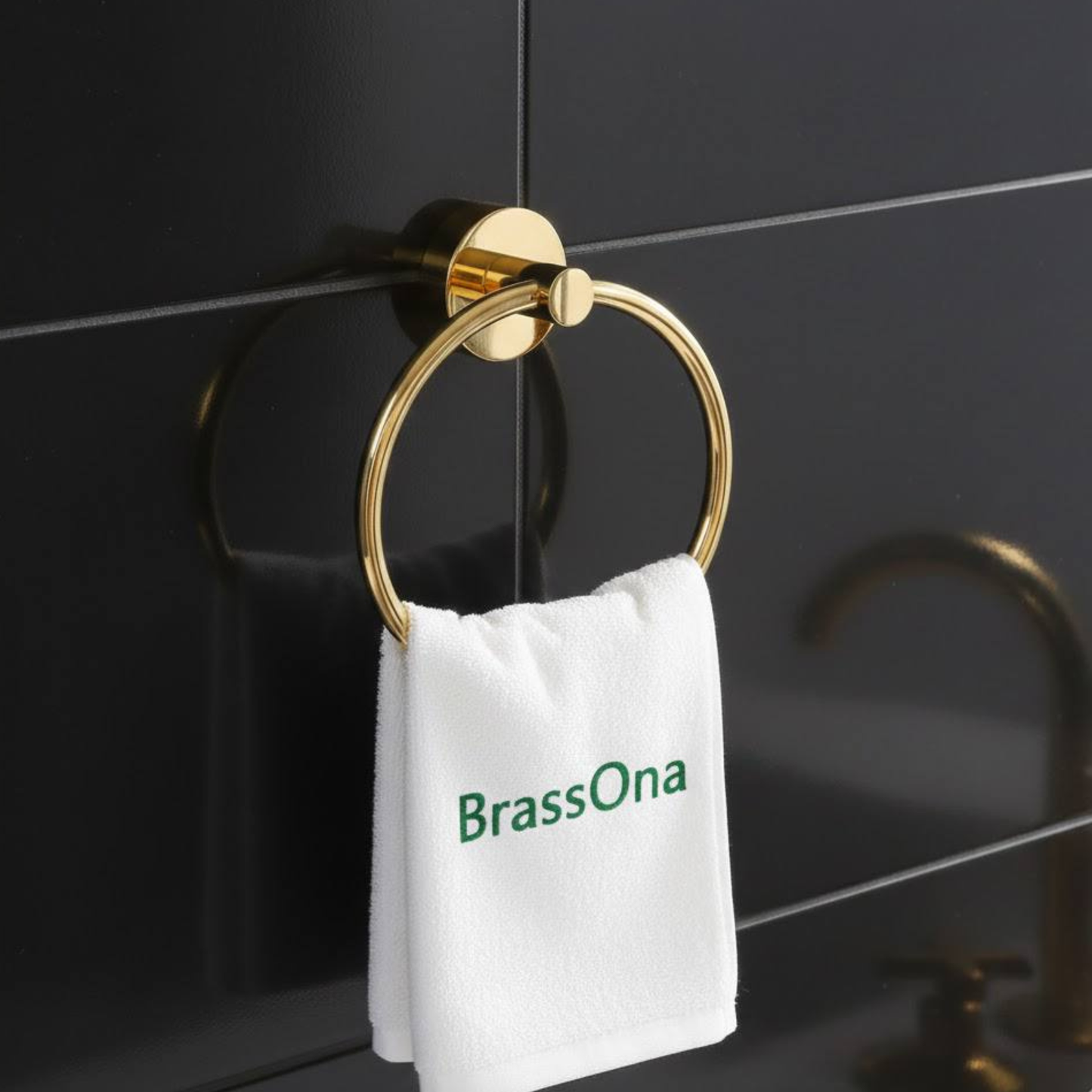Unlacquered brass towel ring holding hand towel in luxury bathroom wall-mounted setup