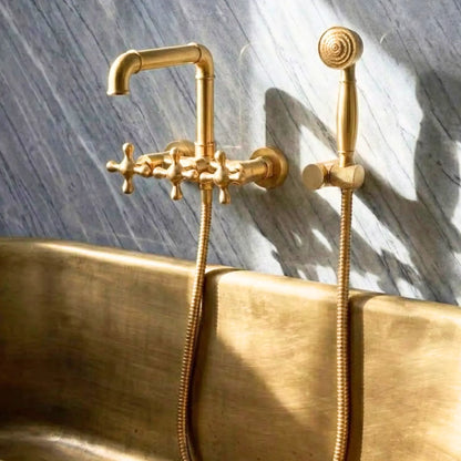 Unlacquered brass wall-mounted clawfoot tub faucet with hand shower, solid brass living finish bathroom fixture